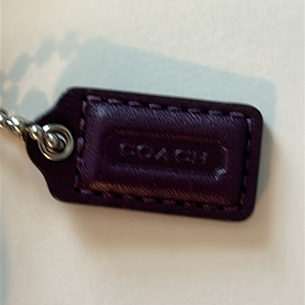 EUC Coach patent leather wristlet in dark purple or plum color and silver metal - Picture 6 of 10